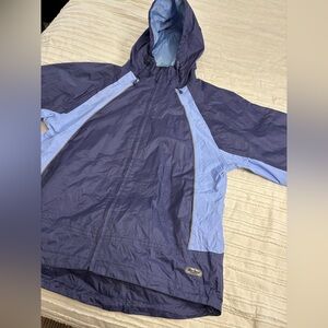 Peter Storm rain jacket. Womens size small. Waterproof nylon. Two tone blue
